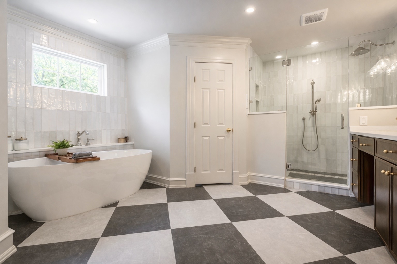 Master bathroom renovation with tile shower and soaking tub